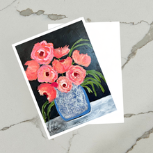 Load image into Gallery viewer, Art print of pink flowers in a blue vase on a white card with a black border.