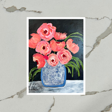 Load image into Gallery viewer, Art print of pink flowers in a blue vase on a marble surface