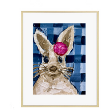 Load image into Gallery viewer, A framed print of a playful bunny with a bright pink peony flower on its head, set against a blue and white gingham background.