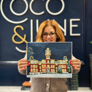 Art print of West Virginia University's Woodburn Hall with Christmas lights by artist Emily Kurth.