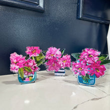 Load image into Gallery viewer, Decorative acrylic cutout of pink rhododendron flowers in a vases on a marble surface with a dark background.  artwork by artist Emily Kurth.