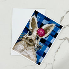 Load image into Gallery viewer, Greeting card with a rabbit holding a pink flower on a blue checkered background