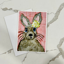 Load image into Gallery viewer, Card with a rabbit illustration on a peach background, on a marble surface.