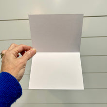 Load image into Gallery viewer, Someone holding a blank open greeting card.