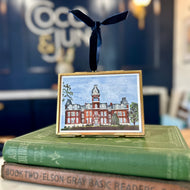 Brass and glass ornament of West Virginia University's Woodburn Hall by artist Emily Kurth.