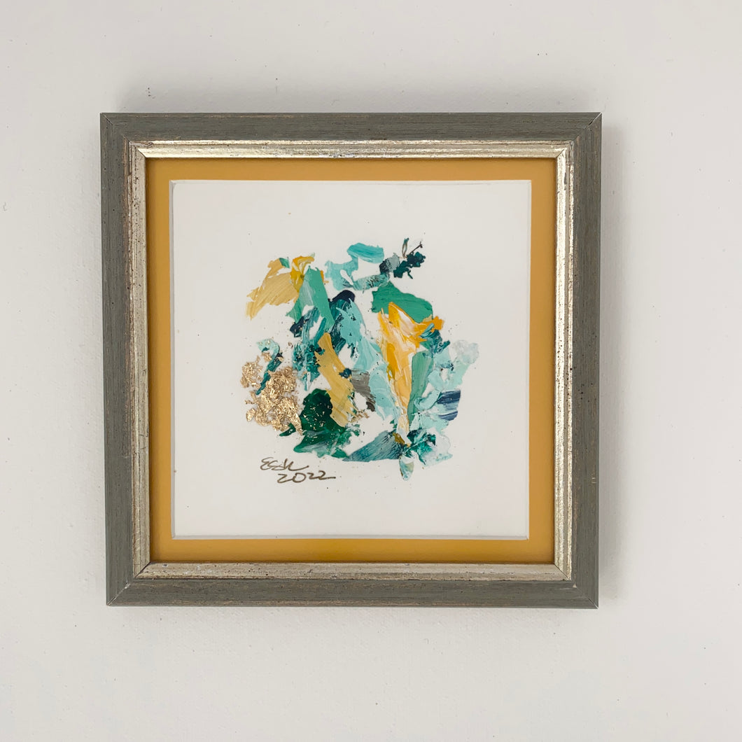 Green and yellow paint chips in abstract art. Brushed champagne frame. 7