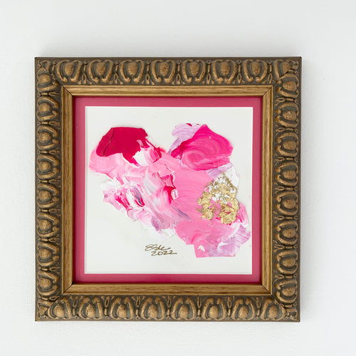 Pink paint chips in abstract art.  Brushed gold frame. 8.25