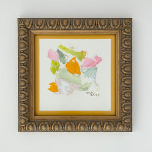 Pink, green, and yellow paint chips in abstract art. Brushed gold frame. 8.25" square by artist Emily Kurth